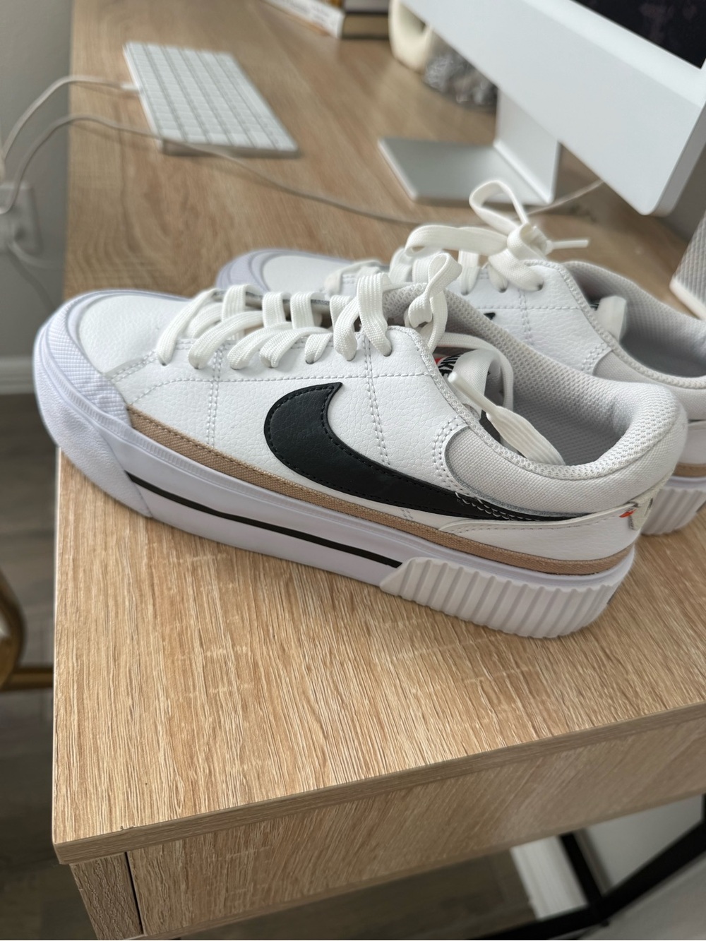 Nike Women’s White Sneakers with Black Swoosh and Tan Trim